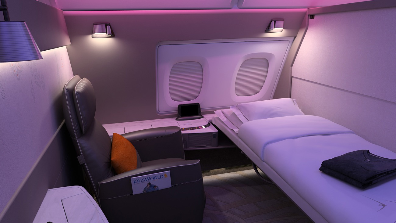 Singapore Airlines A380 First Class suite row on upper deck with sliding doors and leather armchairs
